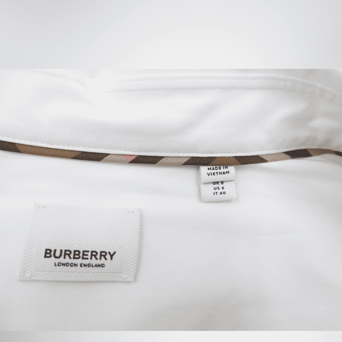 Burberry White Longsleeve – Pre-Owned Luxury Brand Apparel – Antonio & Co Tag