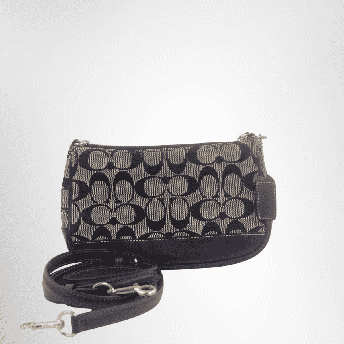 Coach Preowned Luxury Signature Canvas Leather Bag Front View with Strap - Antonio & Co.