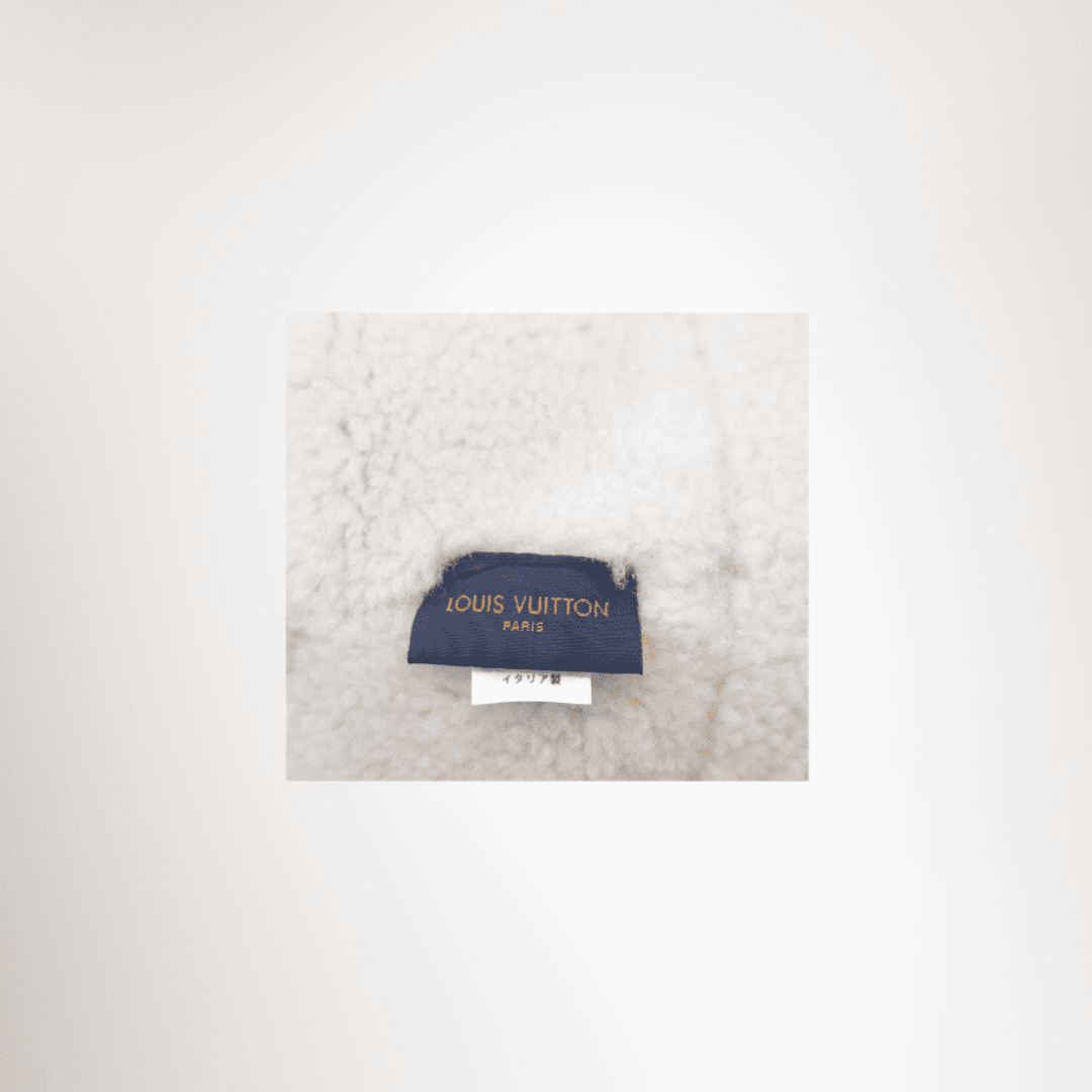 Louis Vuitton Preowned Luxury Shearling Bucket Hat Reverse View With Label 1