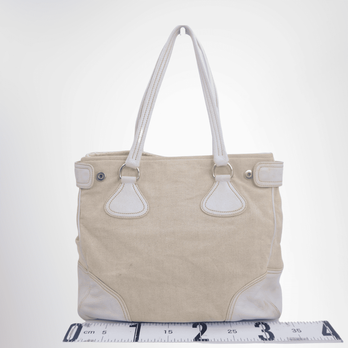 Prada Preowned Luxury White Canvas Leather Tote Bag Front View - Antonio & Co.