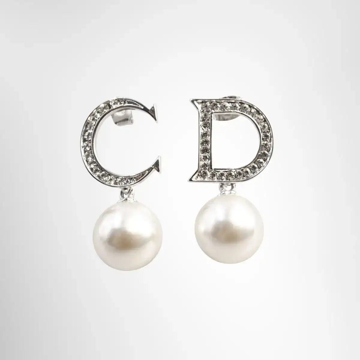 Dior Tribal Pearl Earrings - Silver tone