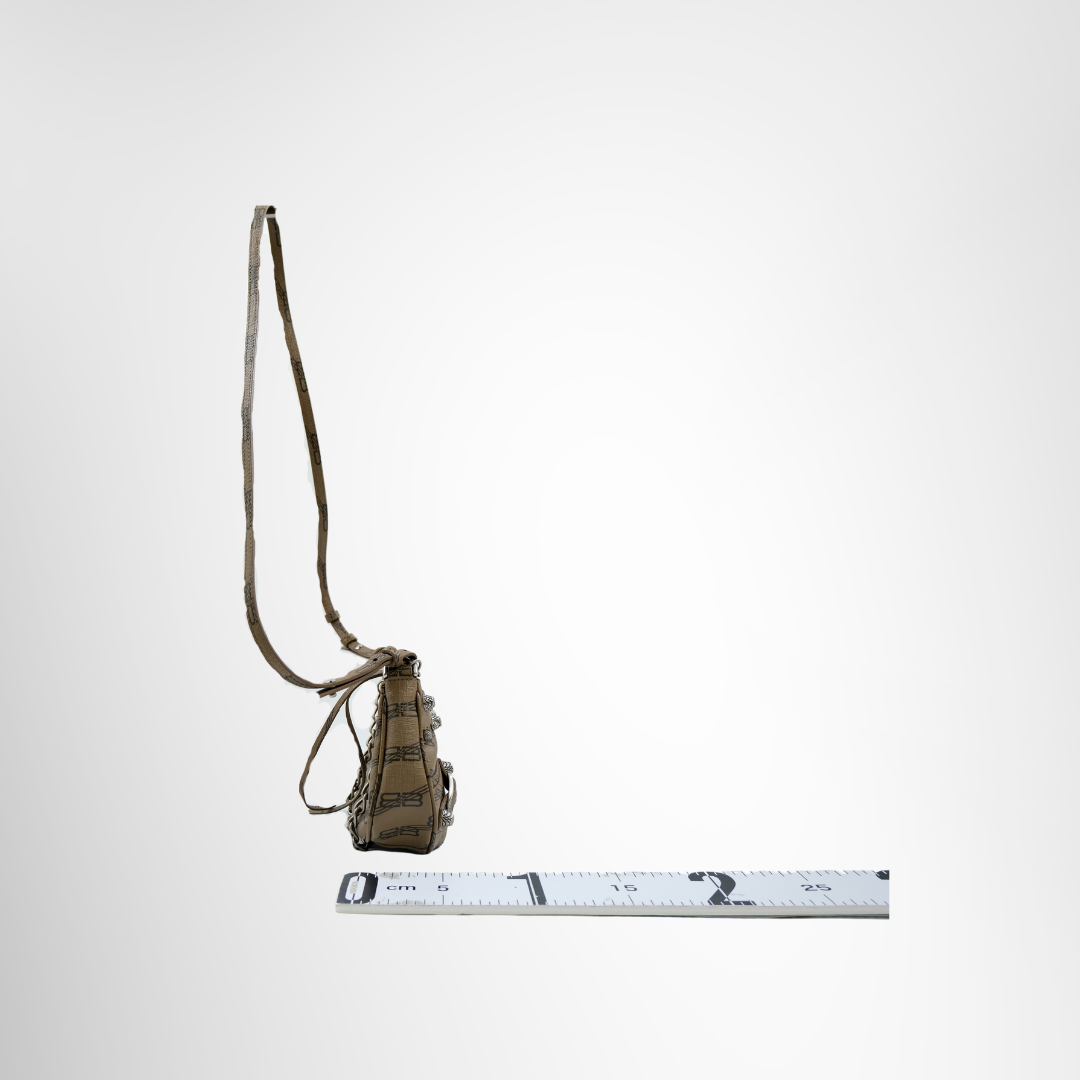 Balenciaga Preowned Luxury Le Cagole Mini Bag in Brown Coated Canvas Bag Side View - Antonio & Co.