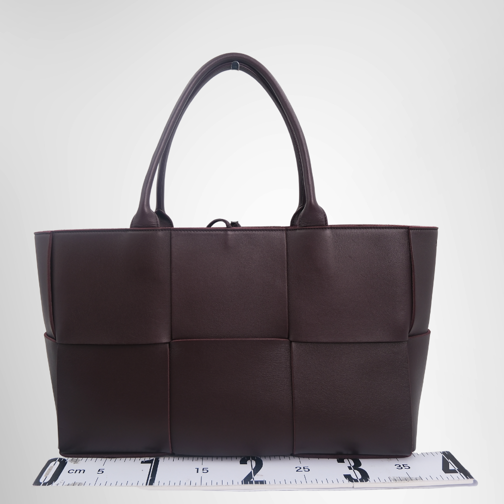 Bottega Veneta Preowned Luxury Arco Tote Bag in Deep Burgundy Bag Front View - Antonio & Co.