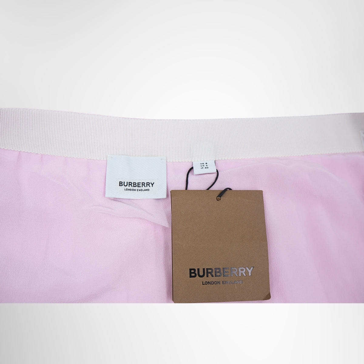 Burberry Pink Mariner Silk Lined Pleated Skirt – Pre-Owned Luxury Brand Apparel – Antonio & Co Tag 