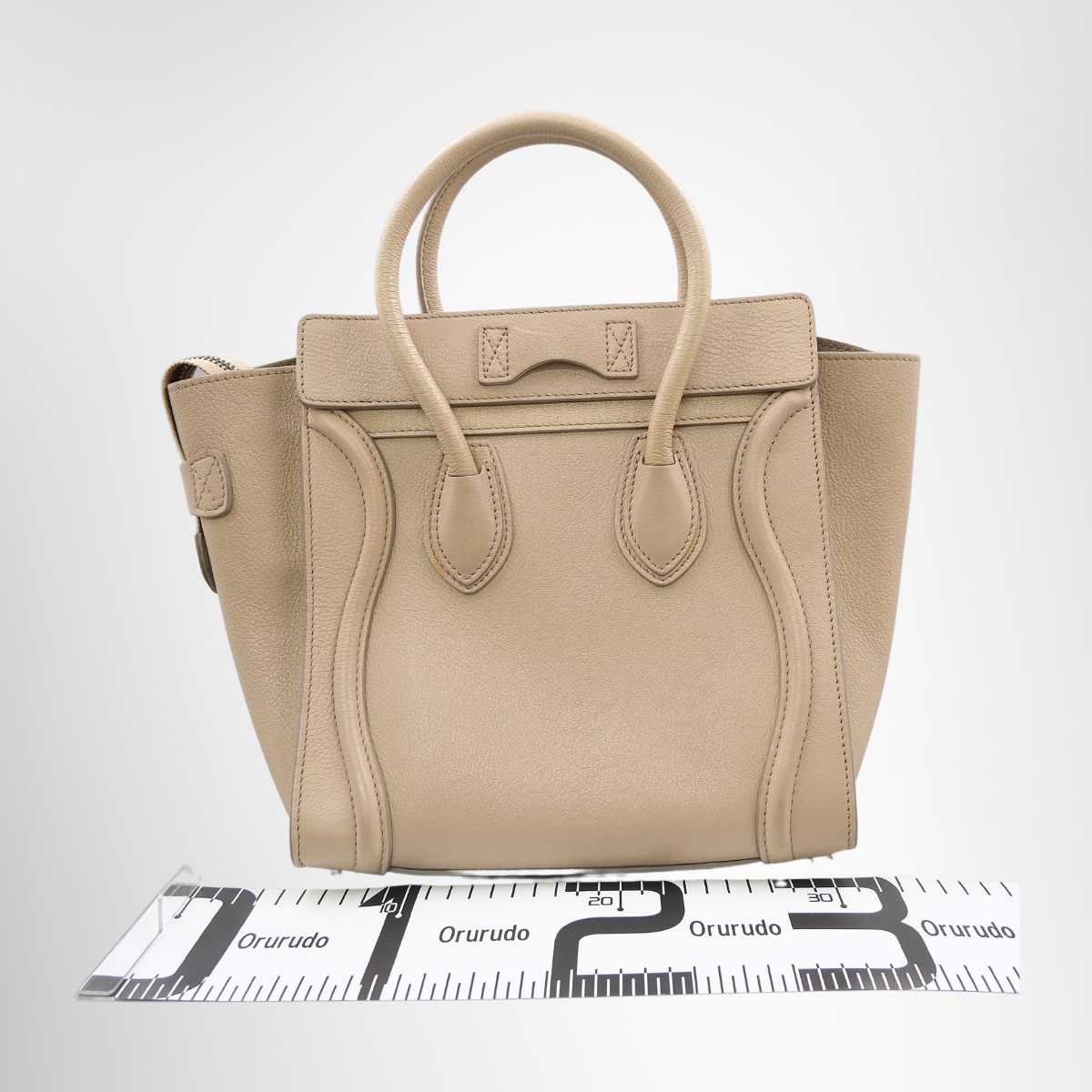 Luggage Micro in Beige Drummed Calfskin Leather