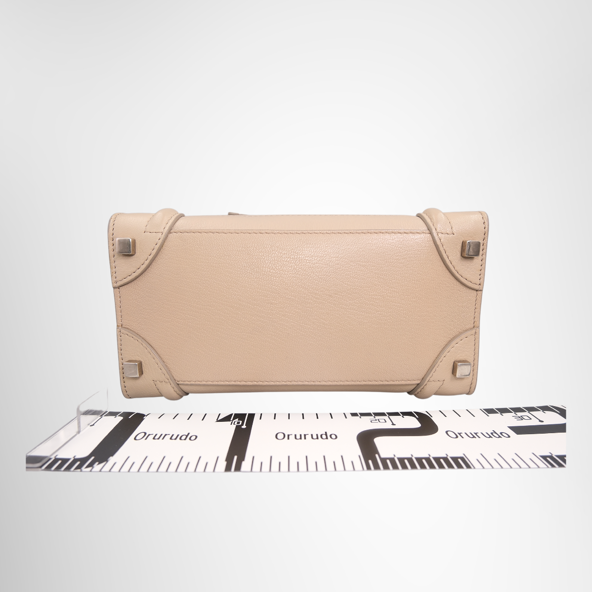 Luggage Micro in Beige Drummed Calfskin Leather
