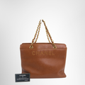 Chanel Preowned Luxury Bag Caviar Logo Chain Leather Tote Front View 2