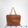 Chanel Preowned Luxury Bag Caviar Logo Chain Leather Tote Front View 3