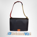 Chanel Preowned Luxury Bag Cube Embossed Boy Flap Bag Front View 2