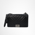 Chanel Preowned Luxury Boy Bag Front Page
