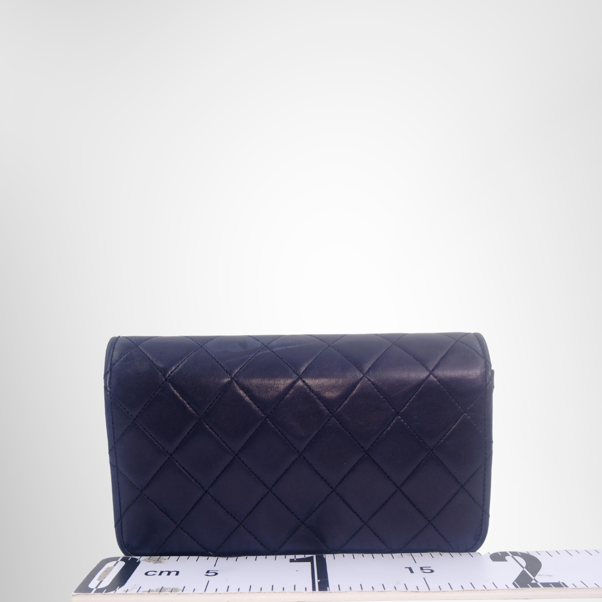 Chanel Preowned Luxury Matrasse Push Rock Chain Navy Lambskin Bag Back View - Antonio & Co.