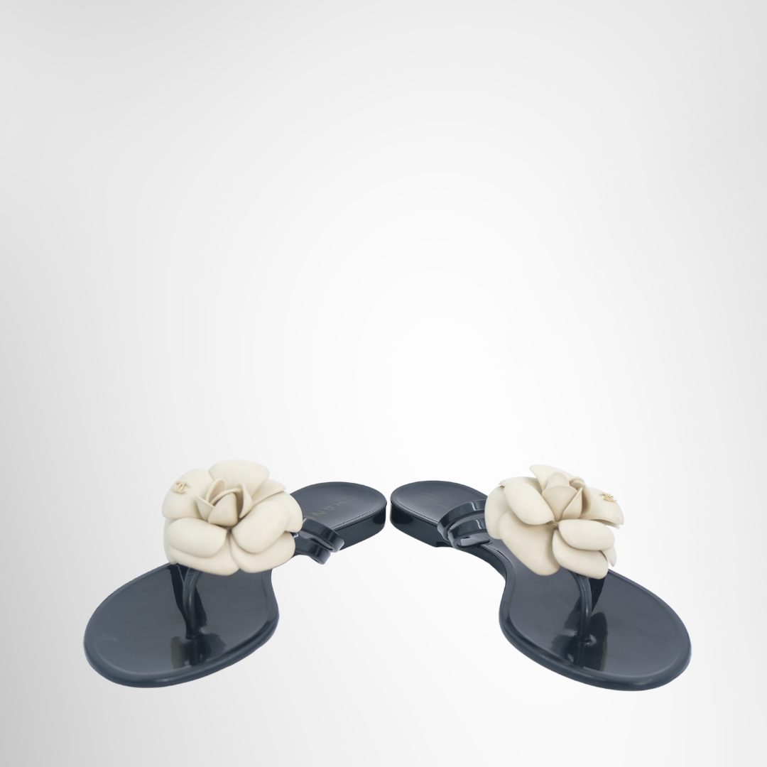 Chanel Preowned Luxury Rubber Camellia Sandals Front And Side View