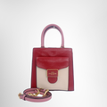 Coach Preowned Luxury 2-Way Hand Bag Front View with Strap - Antonio & Co.