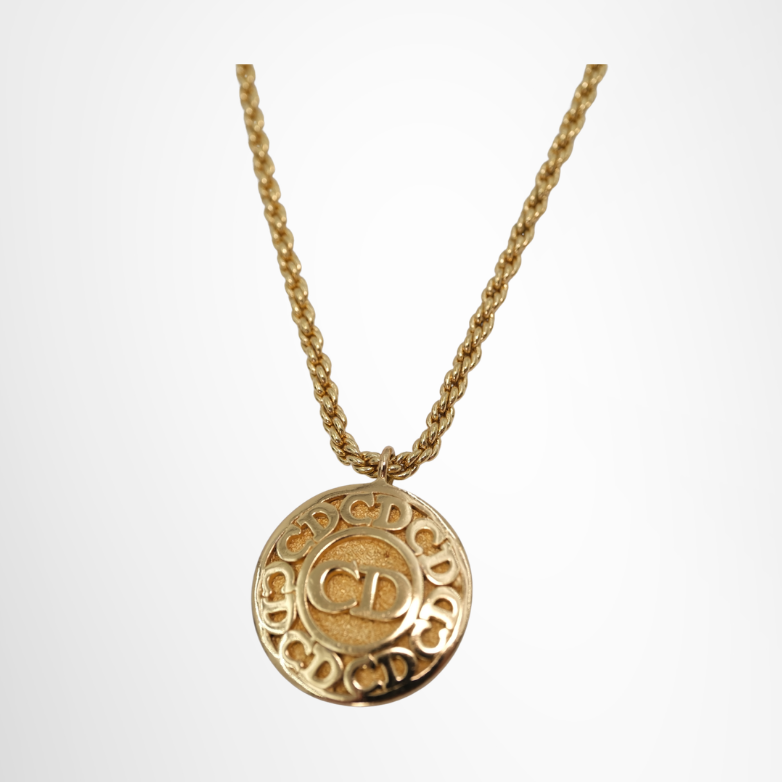 Dior Preowned Luxury Round Pendant CD Logo in Gold Tone Accessories Front Page - Antonio & Co.