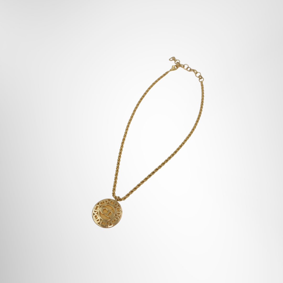 Dior Preowned Luxury Round Pendant CD Logo in Gold Tone Accessories Front View - Antonio & Co.