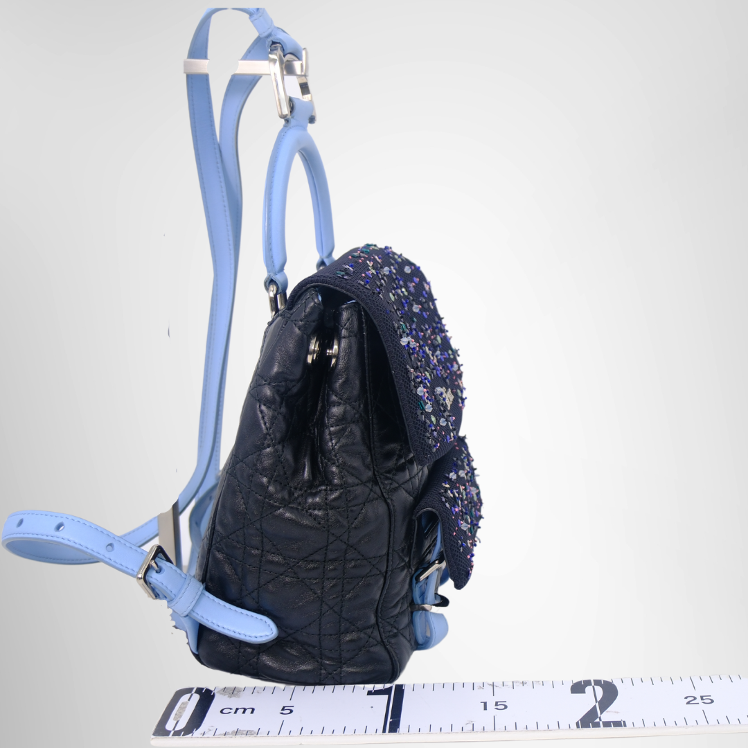 Dior Preowned Luxury Stardust Backpack Bag Side View - Antonio & Co.