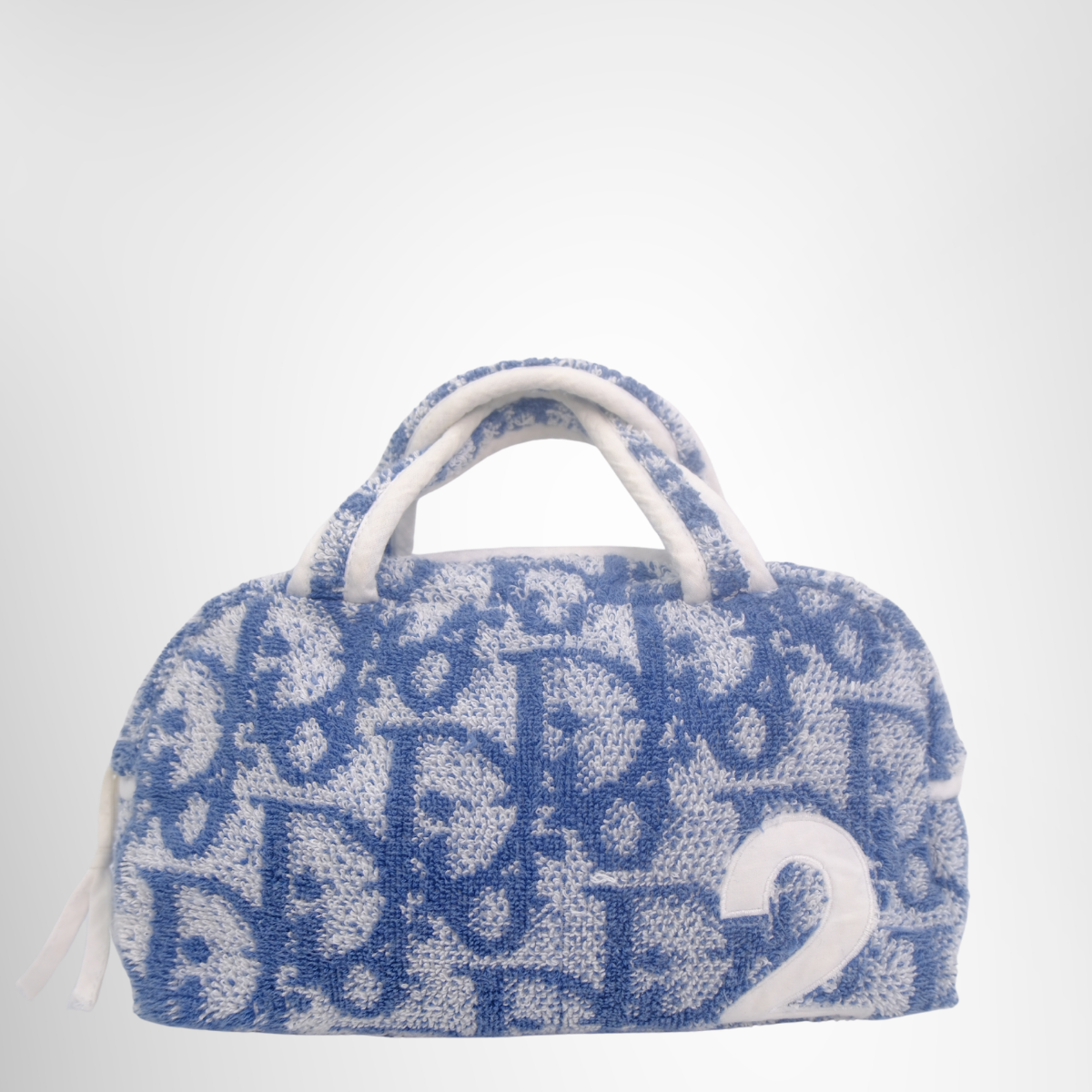 Dior Preowned Luxury Trotter Pine Mini Bag Front Page - Antonio & Co.