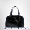 Givenchy Preowned Luxury Embosses Black Handbag Front View - Antonio & Co.
