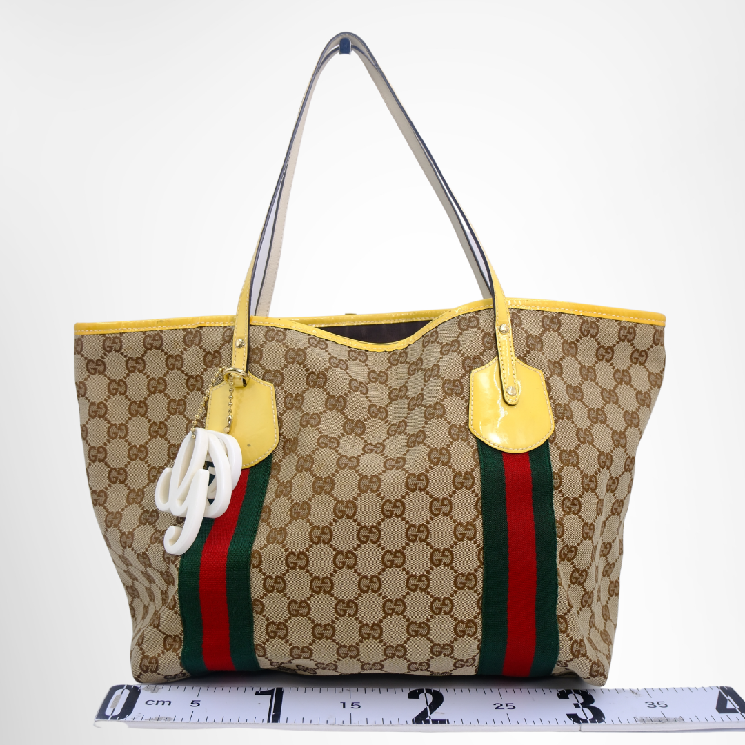Gucci Preowned Luxury Jolie Web GG Canvas Tote Bag in Yellow Front View - Antonio & Co.