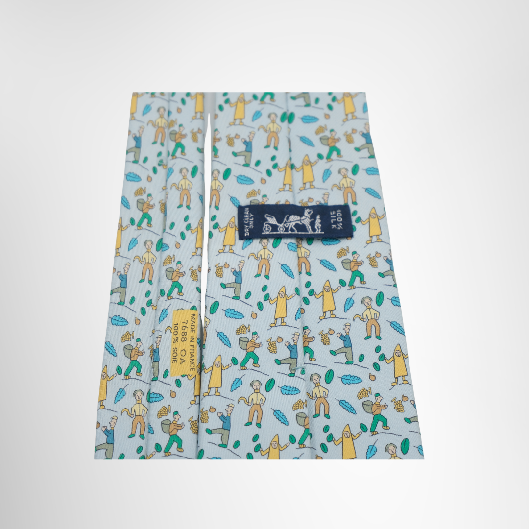 Hermes Preowned Luxury Necktie Light Blue Multicolor Close up View With Brand Tag