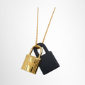 Hermes Preowned Luxury O'Kelly PM Pendant Necklace in Noir Swift Leather Accessories Front Page - Antonio & Co.