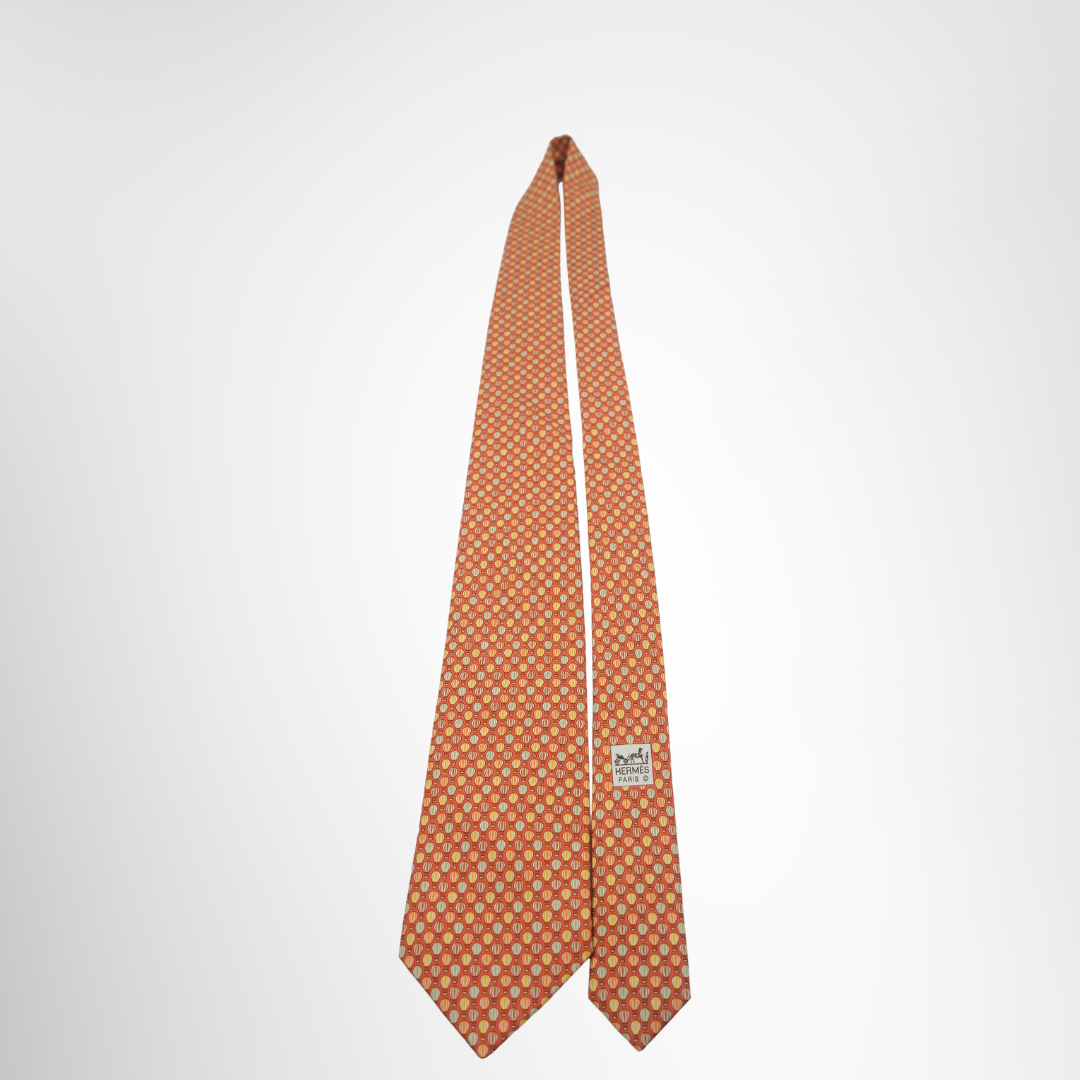 Hermes Preowned Luxury Orange Necktie Front View With Brand Tag