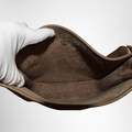 Hermes Preowned Luxury Taurillon Etoupe Evelyn III PM Bag Inside View - Antonio & Co.