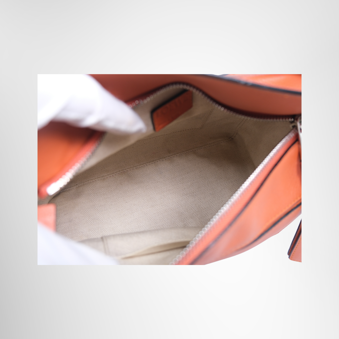 Loewe Preowned Luxury Bag Puzzle Bag in Vibrant Orange Interior View