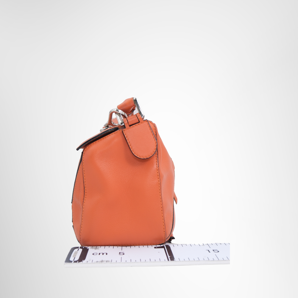 Loewe Preowned Luxury Bag Puzzle Bag in Vibrant Orange Side View