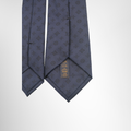 Louis Vuitton Preowned Luxury Monogram Shadow Tie Close up View With Brand Tag