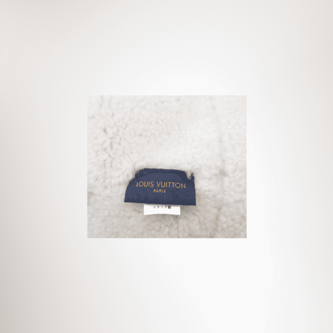 Louis Vuitton Preowned Luxury Shearling Bucket Hat Reverse View With Label 1