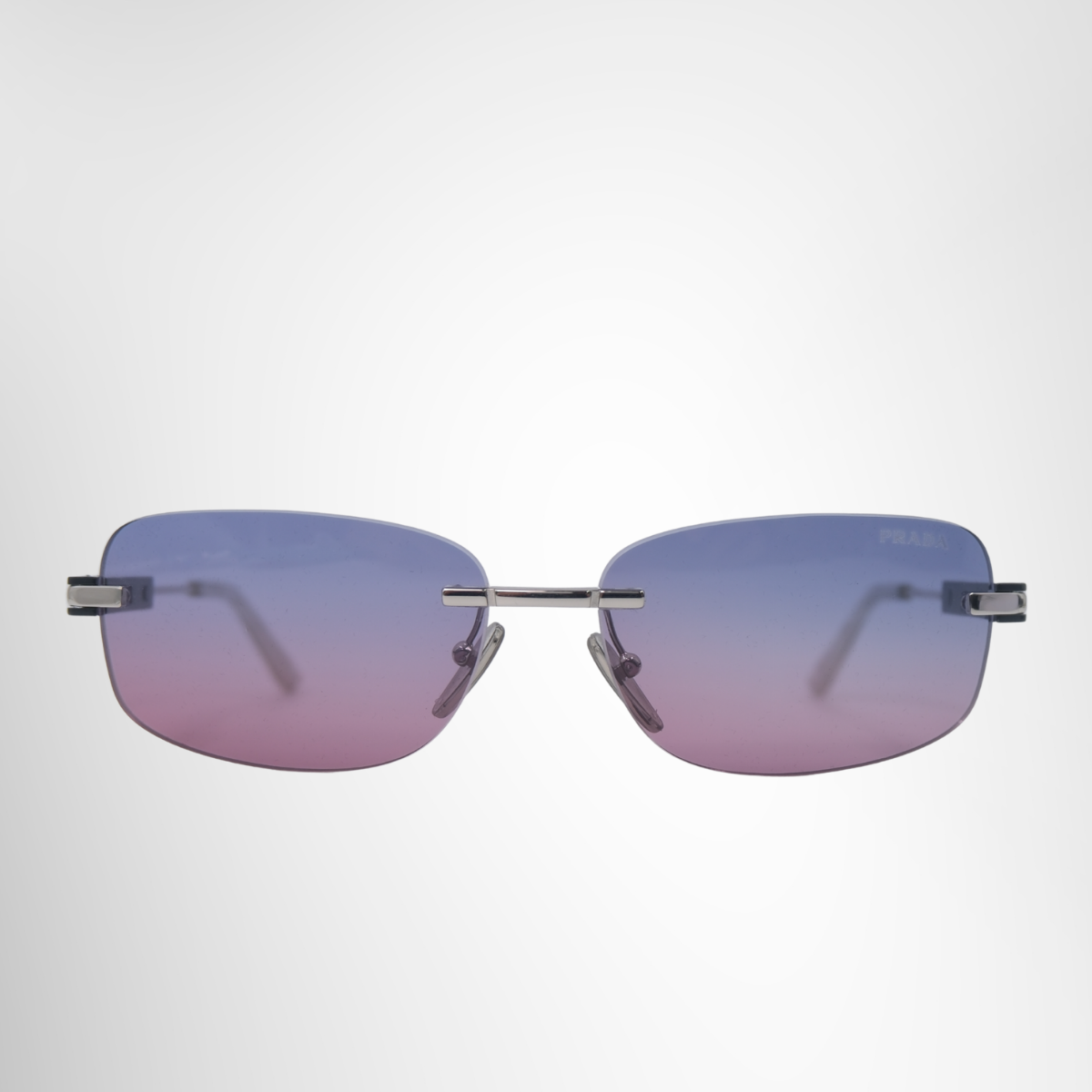 Prada Rectangular Rimless Metal Sunglasses – Pre-Owned Luxury Sunglasses – Antonio & Co Front Page