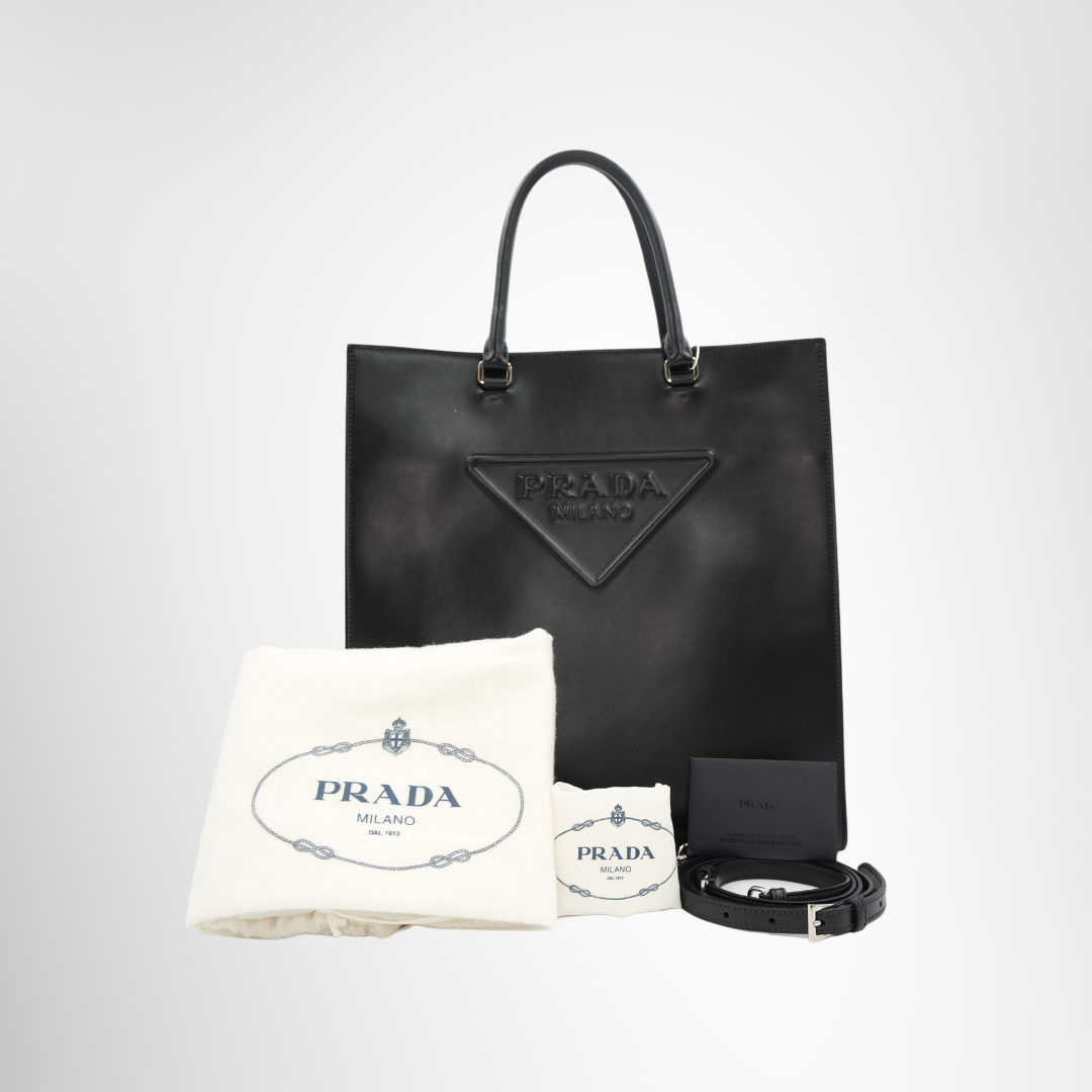 Prada Preowned Luxury Bag Embossed Triangle Logo Tote Bag Front View with Accessories
