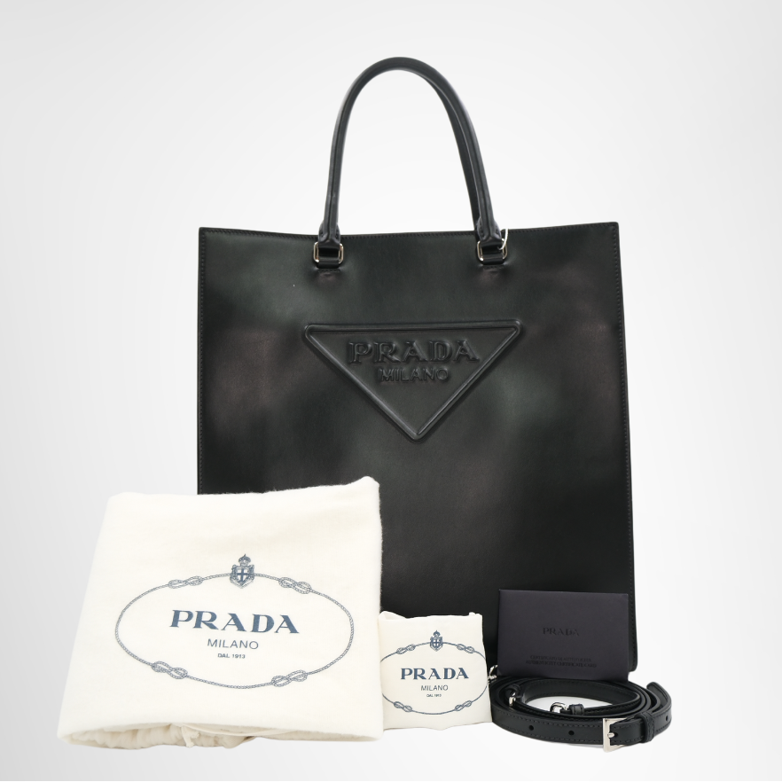 Prada Preowned Luxury Bag Embossed Triangle Logo Tote Bag Front View with Accessories
