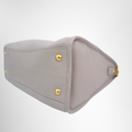 Prada Preowned Luxury Bauletto Vitello Daino Front Zip Satchel Bag Bottom Side View1 - Antonio & Co.