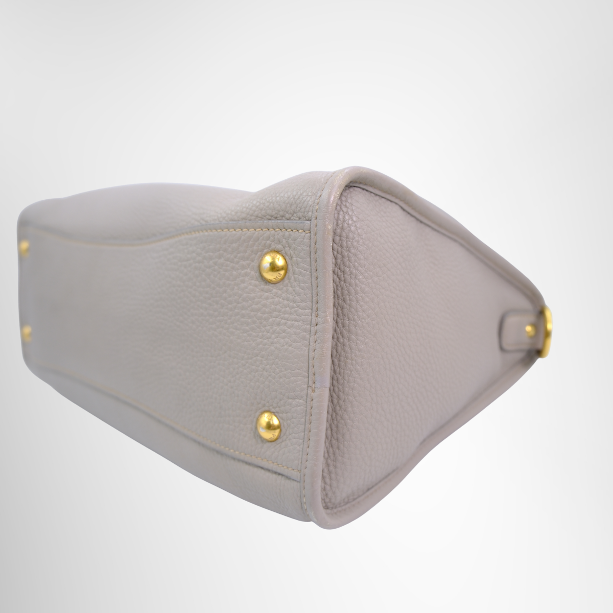 Prada Preowned Luxury Bauletto Vitello Daino Front Zip Satchel Bag Bottom Side View1 - Antonio & Co.