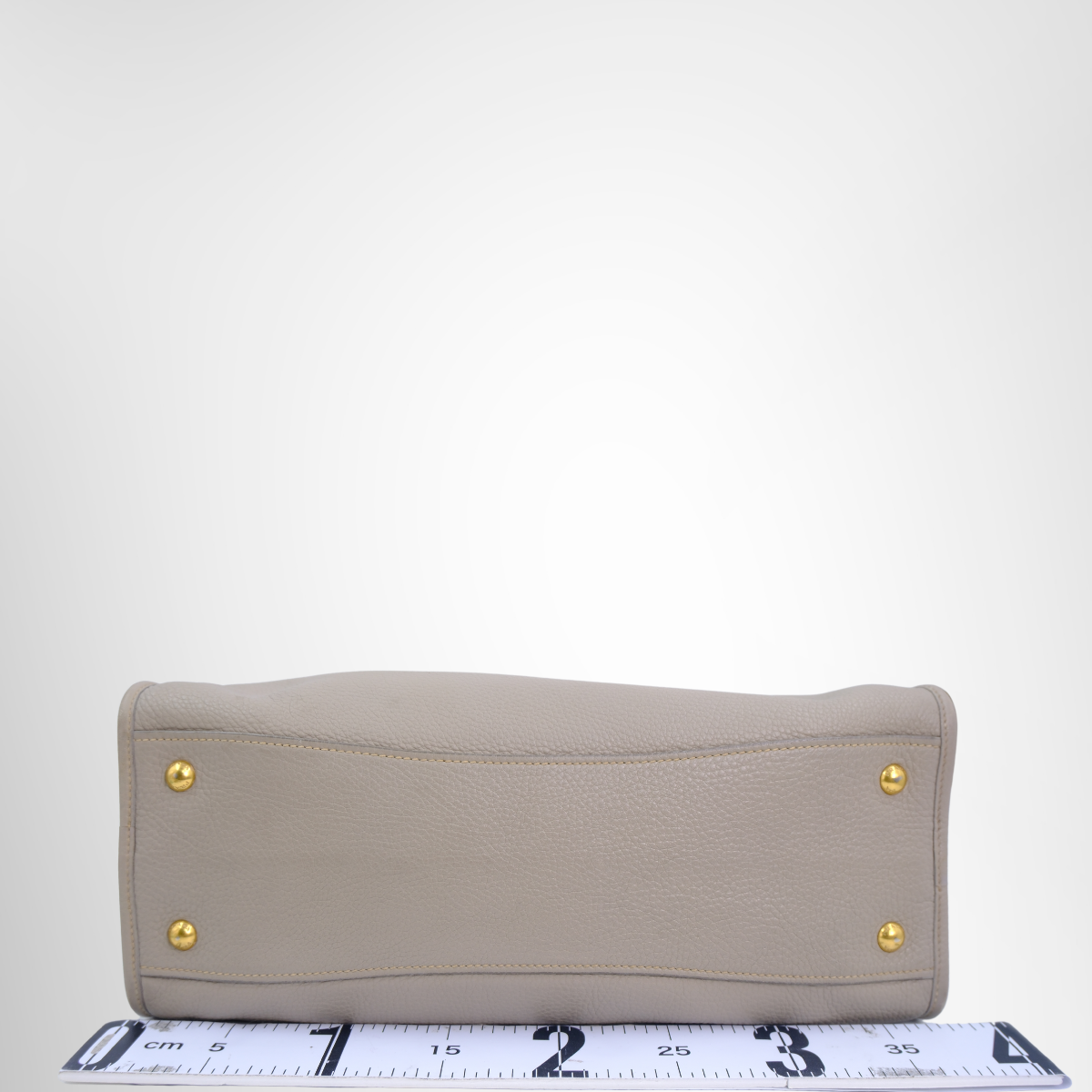 Prada Preowned Luxury Bauletto Vitello Daino Front Zip Satchel Bag Bottom View - Antonio & Co.
