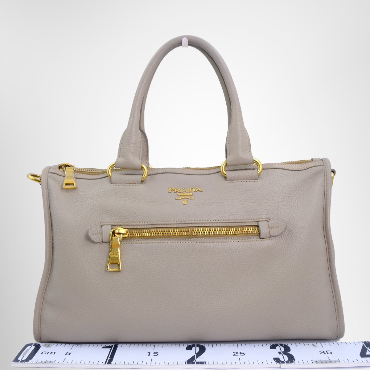Prada Preowned Luxury Bauletto Vitello Daino Front Zip Satchel Bag Front View - Antonio & Co.