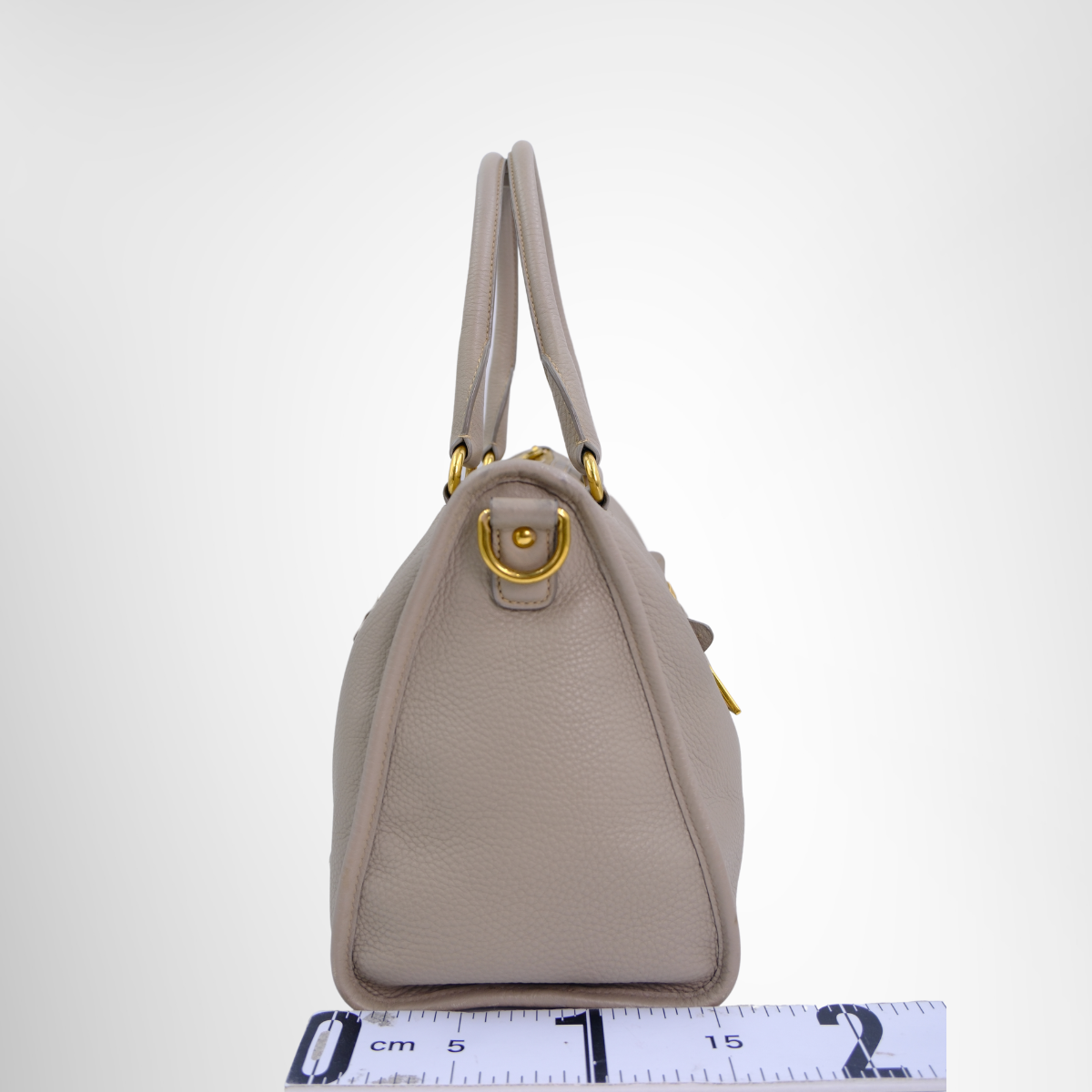 Prada Preowned Luxury Bauletto Vitello Daino Front Zip Satchel Bag Side View - Antonio & Co.