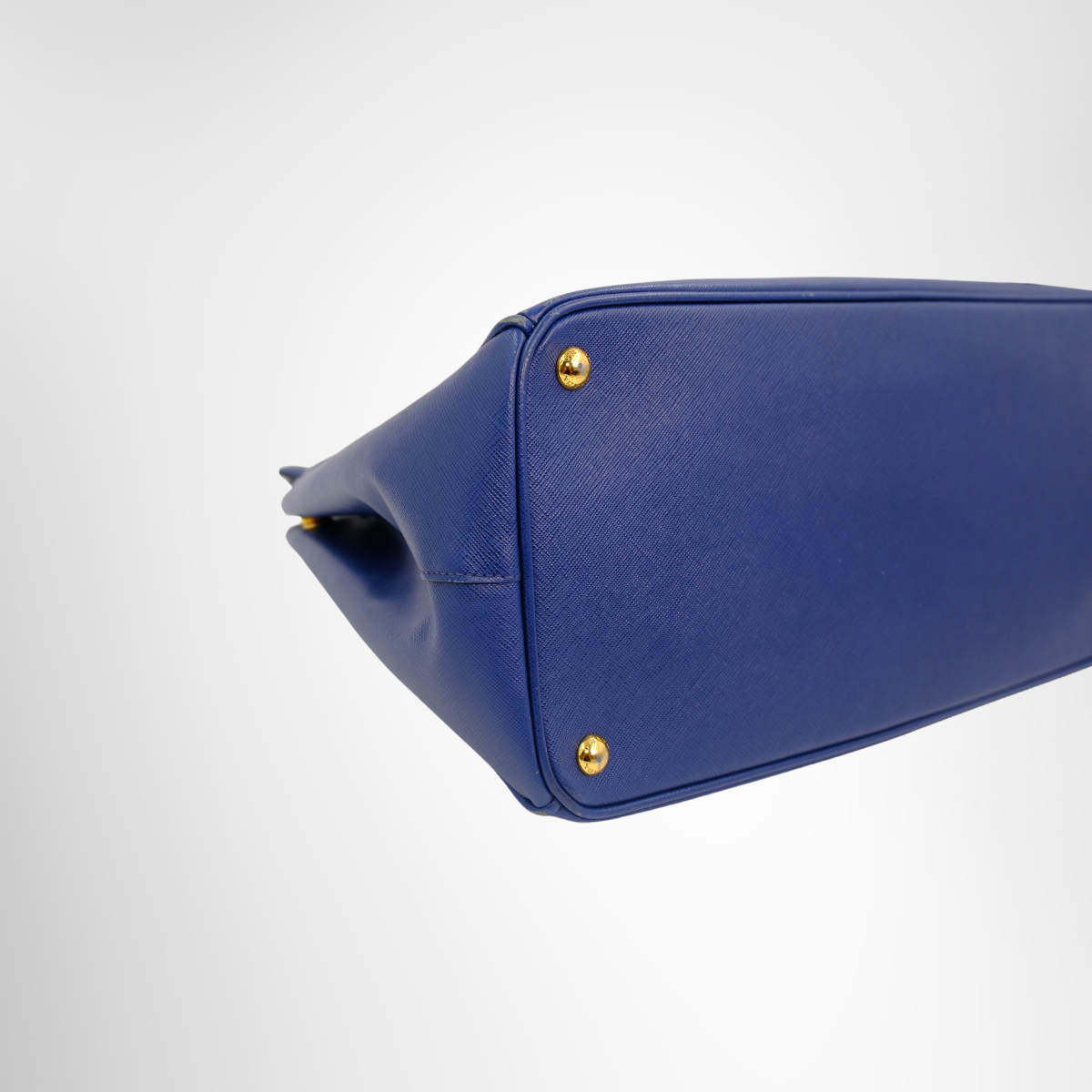 Prada Preowned Luxury Blue Saffiano Bag - Antonio & Co. Bottom Side View2