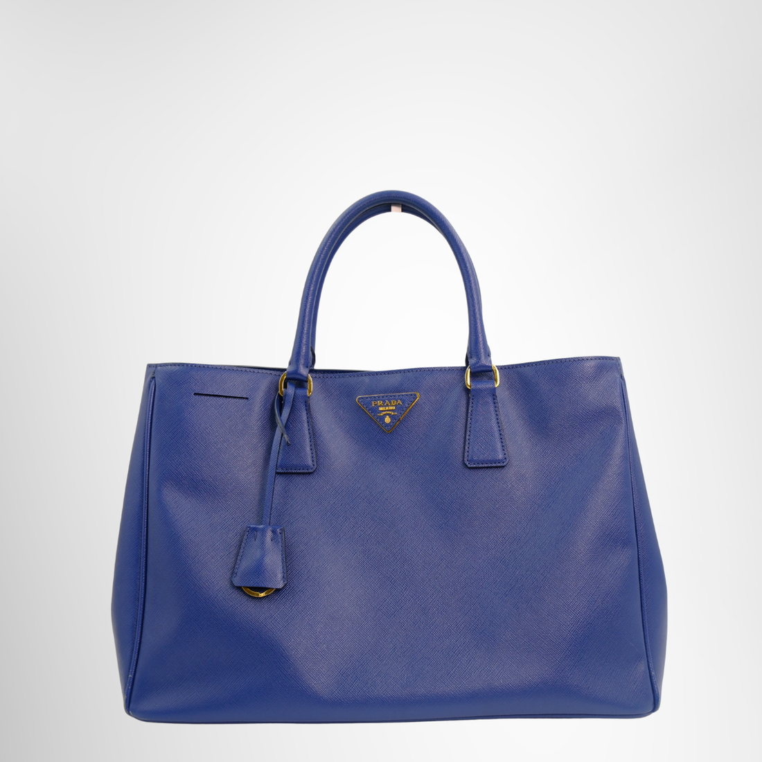 Prada Preowned Luxury Blue Saffiano Bag - Antonio & Co. Front Page