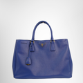 Prada Preowned Luxury Blue Saffiano Bag - Antonio & Co. Front Page