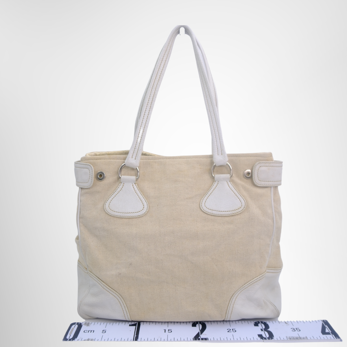 Prada Preowned Luxury White Canvas Leather Tote Bag Front View - Antonio & Co.